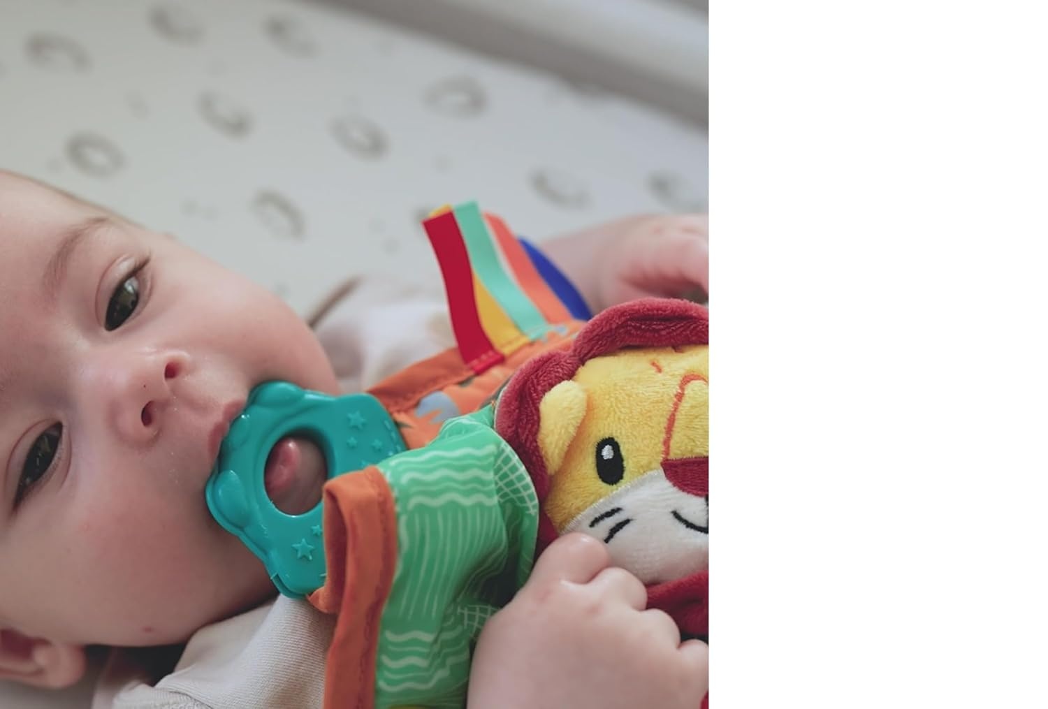 image:imageNuby Plush Teething Blankie Lion Soft Teething Toy with Multiple GumMassaging Surfaces Crinkle and Squeak Sensory Teether for Babies